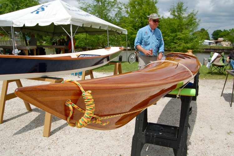 Kerry St. Pé of BTNEP and his hand crafted kayak. Lockport Wood Boat Festival.